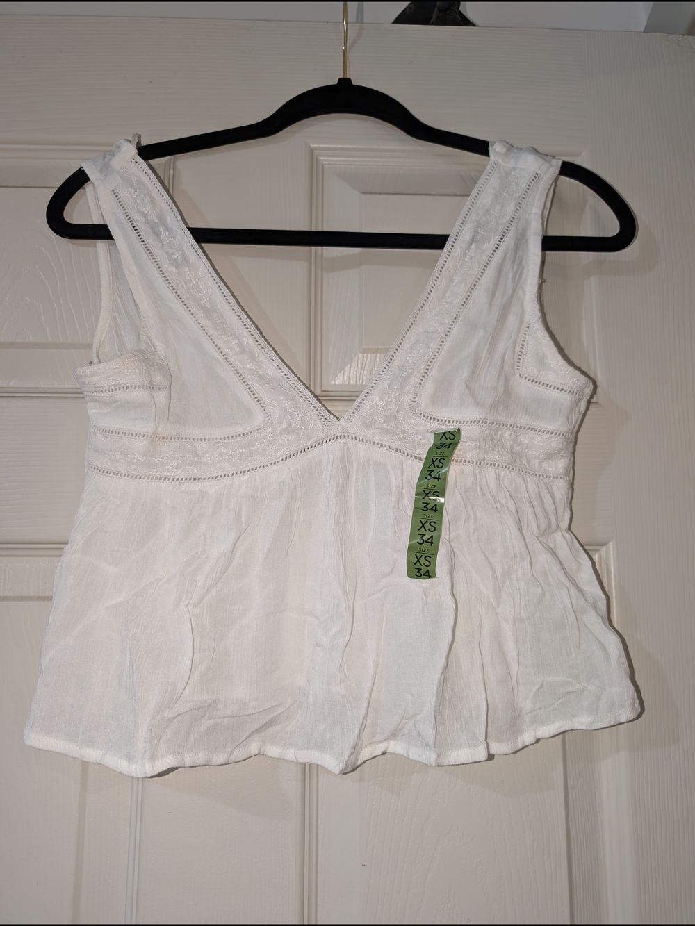 White V-Neck Peplum Top